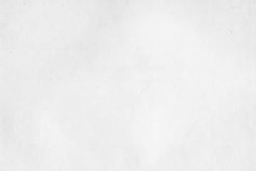 Cardboard white texture close-up. Light old paper background. Grunge concrete wall. Vintage blank wallpaper.