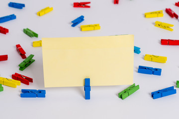 Colored clothespin papers empty reminder white floor background office