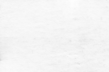 Fototapeta premium Cardboard white texture close-up. Light old paper background. Grunge concrete wall. Vintage blank wallpaper.