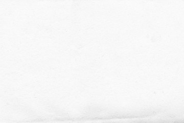 Cardboard white texture close-up. Light old paper background. Grunge concrete wall. Vintage blank wallpaper.