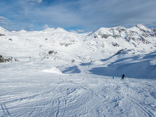 Fototapeta na wymiar Amazing skiing slopes in Austrian Alps. Gorgeous snow park with breathtaking views. Pure joy and fun.