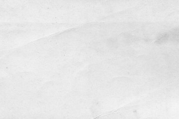 Cardboard white texture close-up. Light old paper background. Grunge concrete wall. Vintage blank wallpaper.