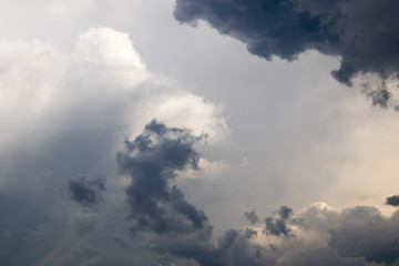 Naklejka na ściany i meble Storm clouds background, dramatic sky.