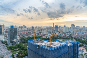 Hanoi skyline view with under construction building at Thanh Cong lake, Ba Dinh district