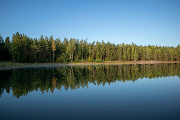 Fototapeta na wymiar calm late summer lake scenery, Finland
