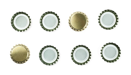 Set new golden bottle cap for beer isolated on white, top view, macro 