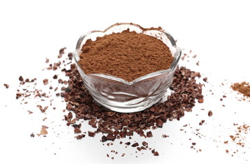 Chopped and powder cocoa pile in glass bowl isolated on white background