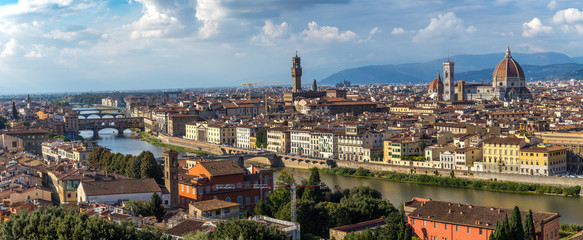 Florence, Tuscany, Italy: Panoramic view of the old town with towering Cathedral of Santa Maria del Fiore and Giotto's bell tower