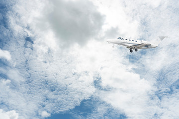 Fototapeta na wymiar Private jet is flying