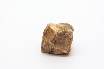 Natural brown stone isolated on white background