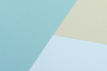 Paper yellow, blue empty background, geometrically located. Color blank for presentations, copy space.