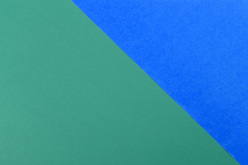 Fototapeta na wymiar Paper blue, green empty background, geometrically located. Color blank for presentations, copy space.