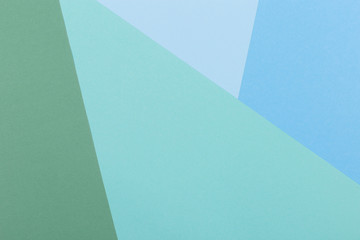 Paper blue, green, pastel empty background, geometrically located. Color blank for presentations, copy space.