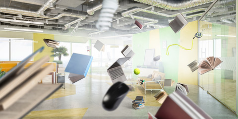 Sunny bright furniture office with objects flying around