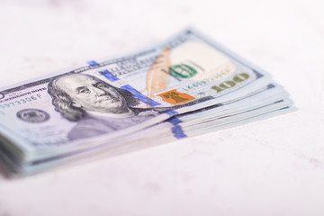 Close-up american dollar banknotes. Stack of one hundred dollar bills