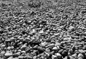 Pile of small gravel stones in black and white.