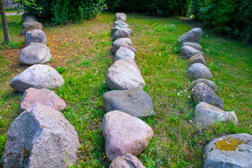stones in a row in the green