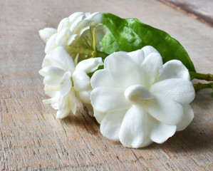Fototapeta na wymiar bouquet of white flowers on wooden background