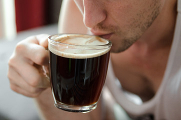 man with cup of coffee