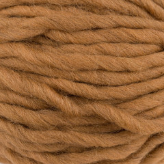 Brown wool skein texture closeup 