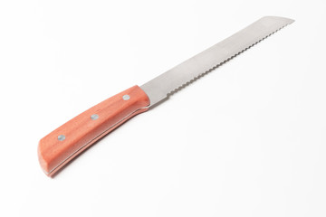 A beautiful knife to cut bread on a white background, saw knife