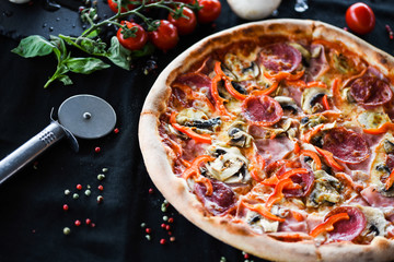 tasty italian capricciosa pizza with fresh ingredients