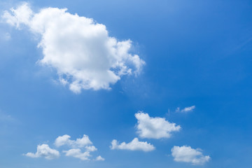 Summer blue sky, white cloud floating over clear blue sky, weather and season concept background