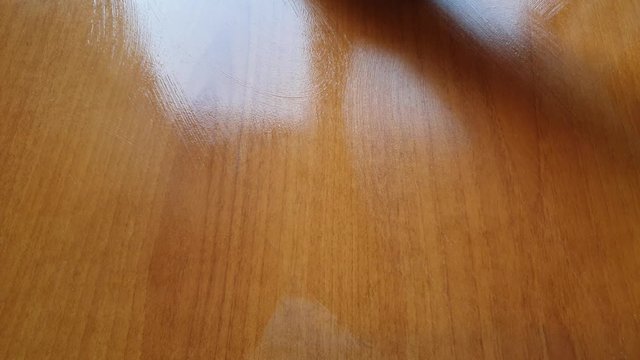Table cleaning. Wipe the table with a rag. Wash the table.