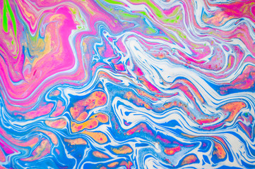 Naklejka premium Abstract colorful painting background made in fluid art technique. Trendy multicolored pattern.