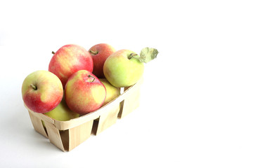 basket of apples on white background