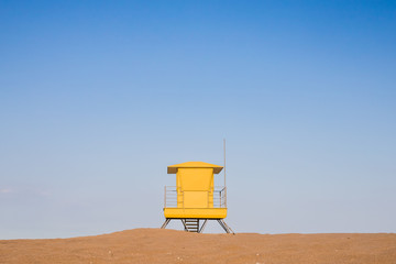 Yellow beach guardhouse