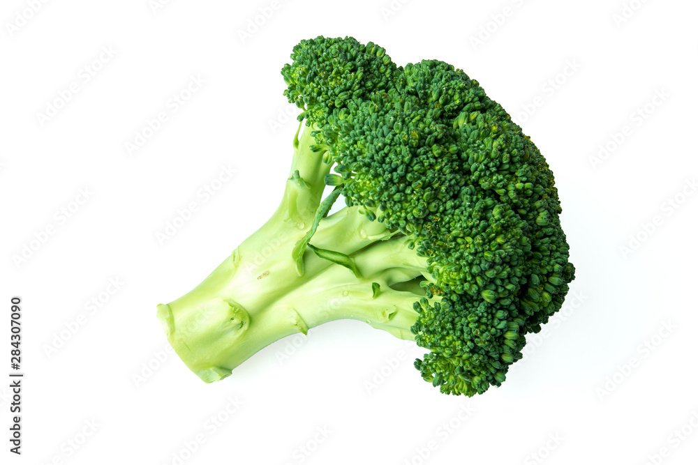 Wall mural fresh green broccoli isolated on white