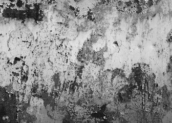 Grungy rusted metal surface in black and white.