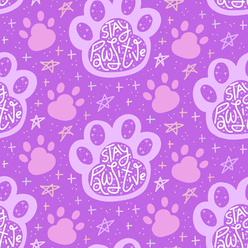 Stay Pawsitive lettering in paw print, monochrome purple seamless pattern