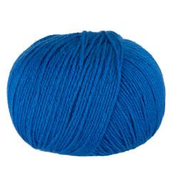 Blue ball of wool yarn isolated on a white background. Space for text.