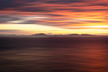 Fototapeta na wymiar Sunset seascape scene on Isle of Skye, Scotland