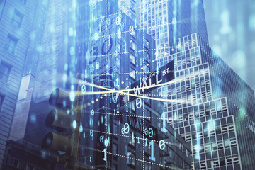 Data theme hologram drawing on city view with skyscrapers background multi exposure. Bigdata...