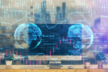 Financial graph colorful drawing and table with computer on background. Double exposure. Concept of international markets.