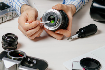 Repair of photographic equipment. Engineer - technician engineer disassembling, align and adjusts...
