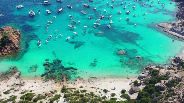 Aerial drone video of paradise turquoise beach in Sardinia, Italy