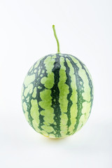 One watermelon with fresh fruits on white background