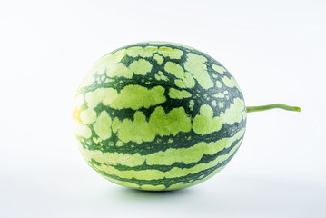 One watermelon with fresh fruits on white background