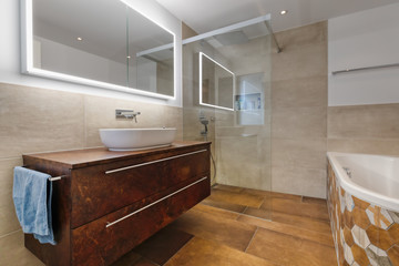 Naklejka na ściany i meble Interior of a modern bathroom with brown furniture
