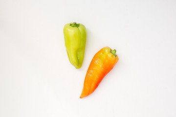 Summer harvest of vegetables concept. Set of green and red peppers.