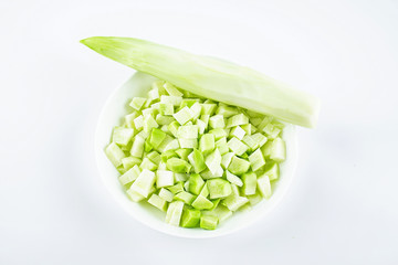 A dish of chopped diced cranberries on a white background