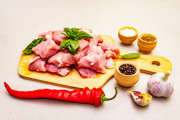 Raw pork neck, cut into pieces with fresh vegetables and dry spice