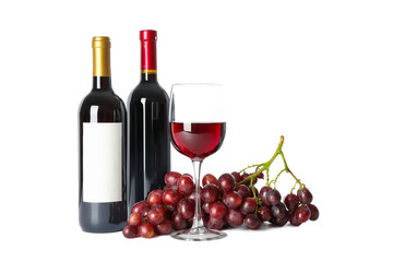 Grapes, bottles and glass with wine isolated on white background