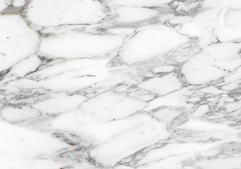 Calacatta Marble Texture made of a mix between a pure White and Grey hues. White stone background.