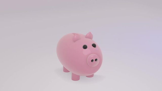 The piggy bank at the beginning decreases, then increases in size when gold coins fall.