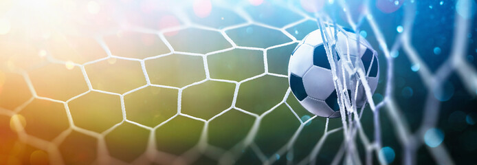 Fototapeta Soccer Ball in Goal Multicolor Background obraz